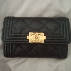 Boy Chanel flap wallet in black and gold